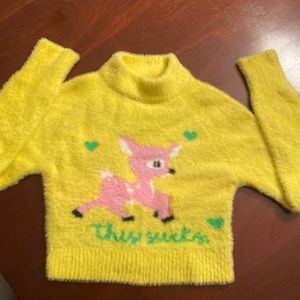Adorable yellow cropped sweater. Mock t-neck with pink deer on front.